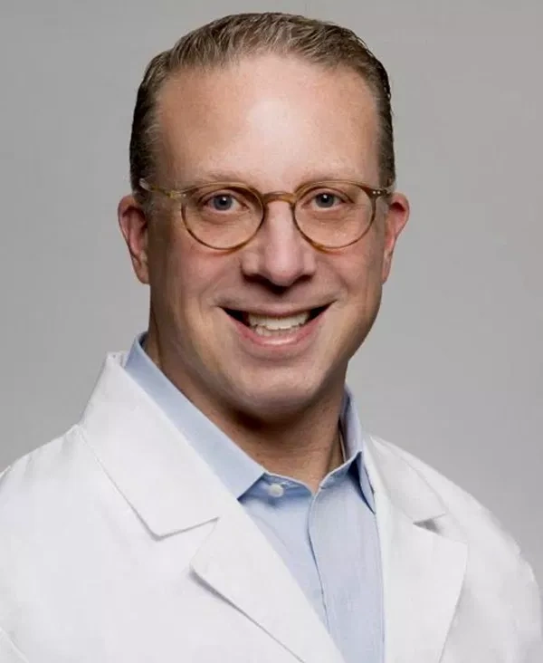 Portrait of Dr. Daniel M. Miller, attending physician in Critical Care Medicine at Northwell Health.